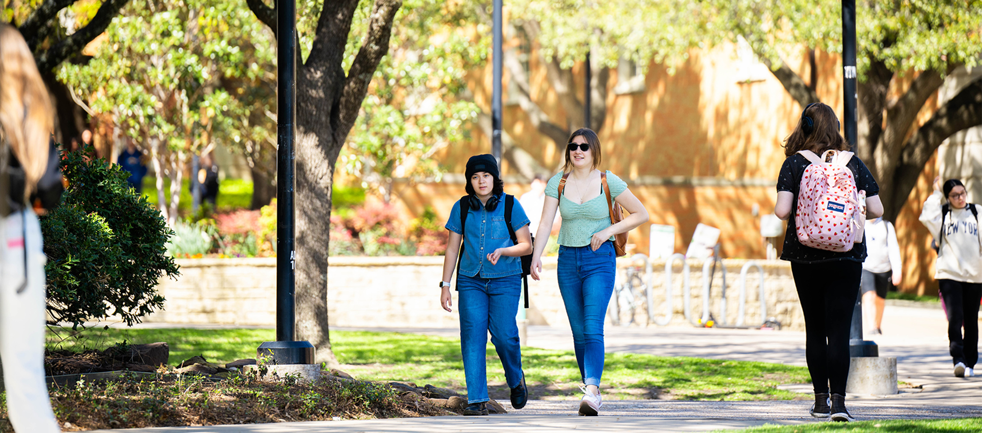 Two students walking on UNT Denton campus