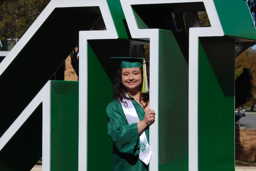 Maria De Jesus Contreras in commencement regalia