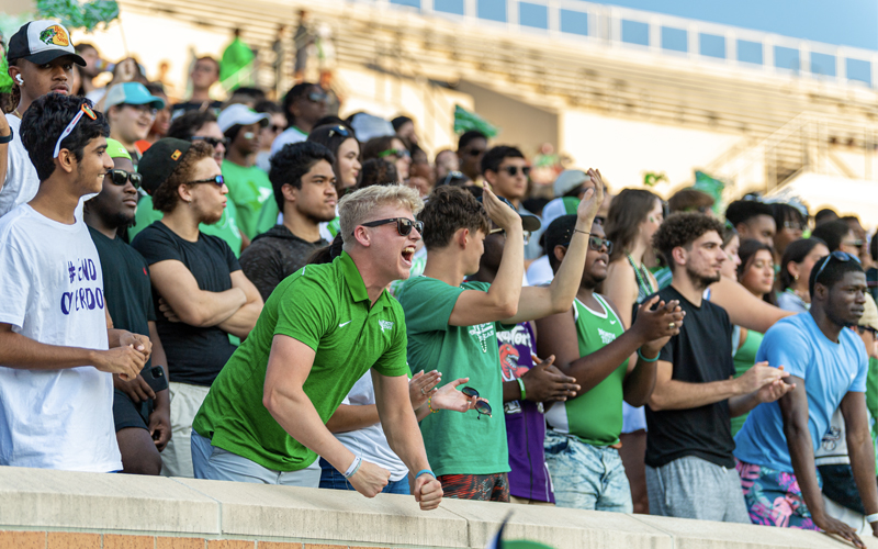 UNT students cheering at game