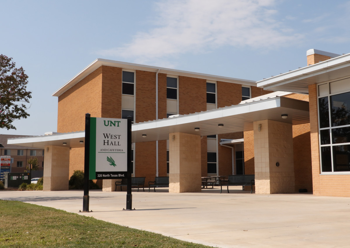 West Hall sign and building in the background